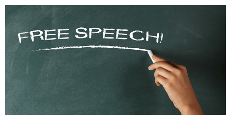 Free speech written on green chalkboard