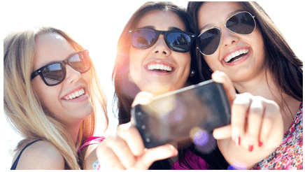 Women taking selfie